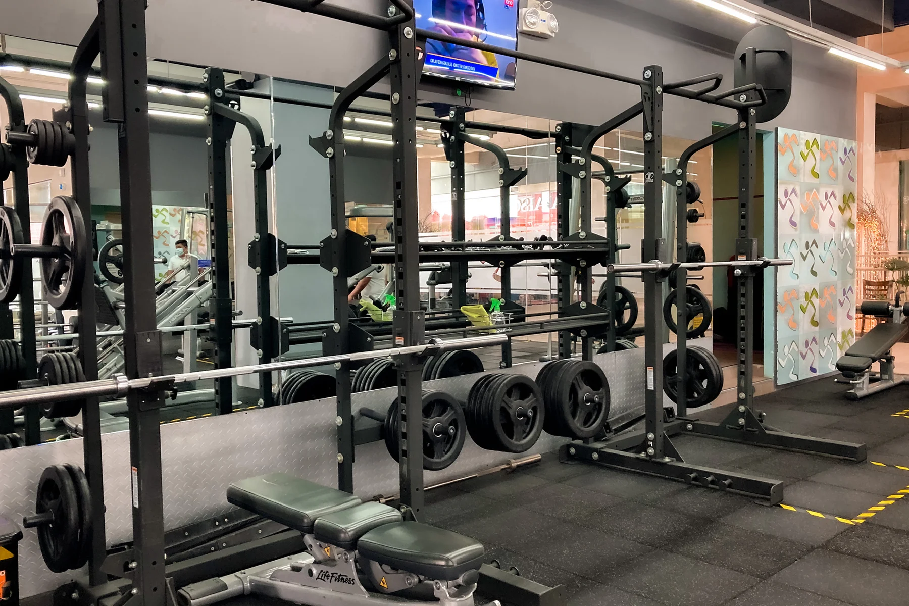 Commercial strength training equipment installed in a gym